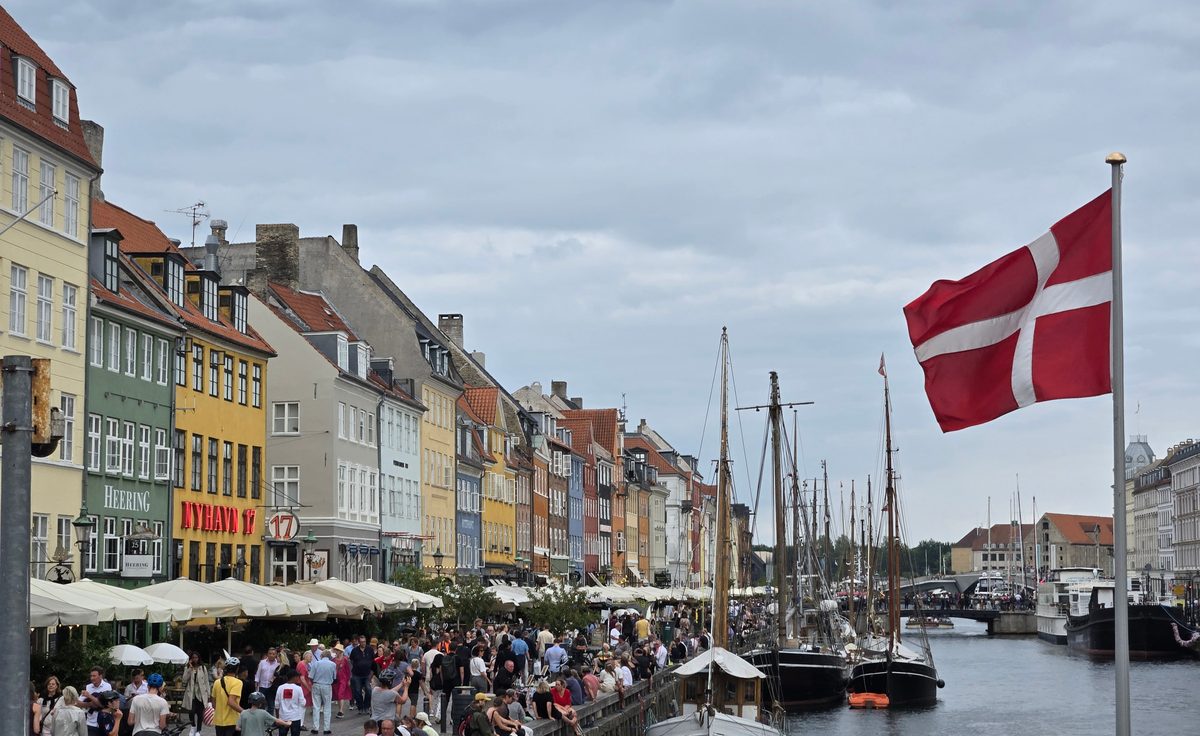 Nyhavn with Danish flag