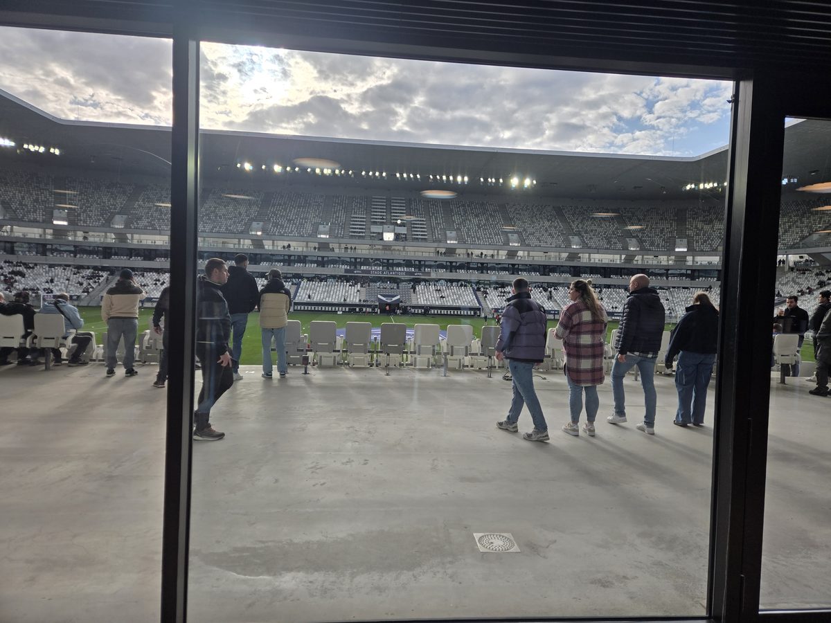 View from the VIP box looking out over the pitch and mostly empty stadium