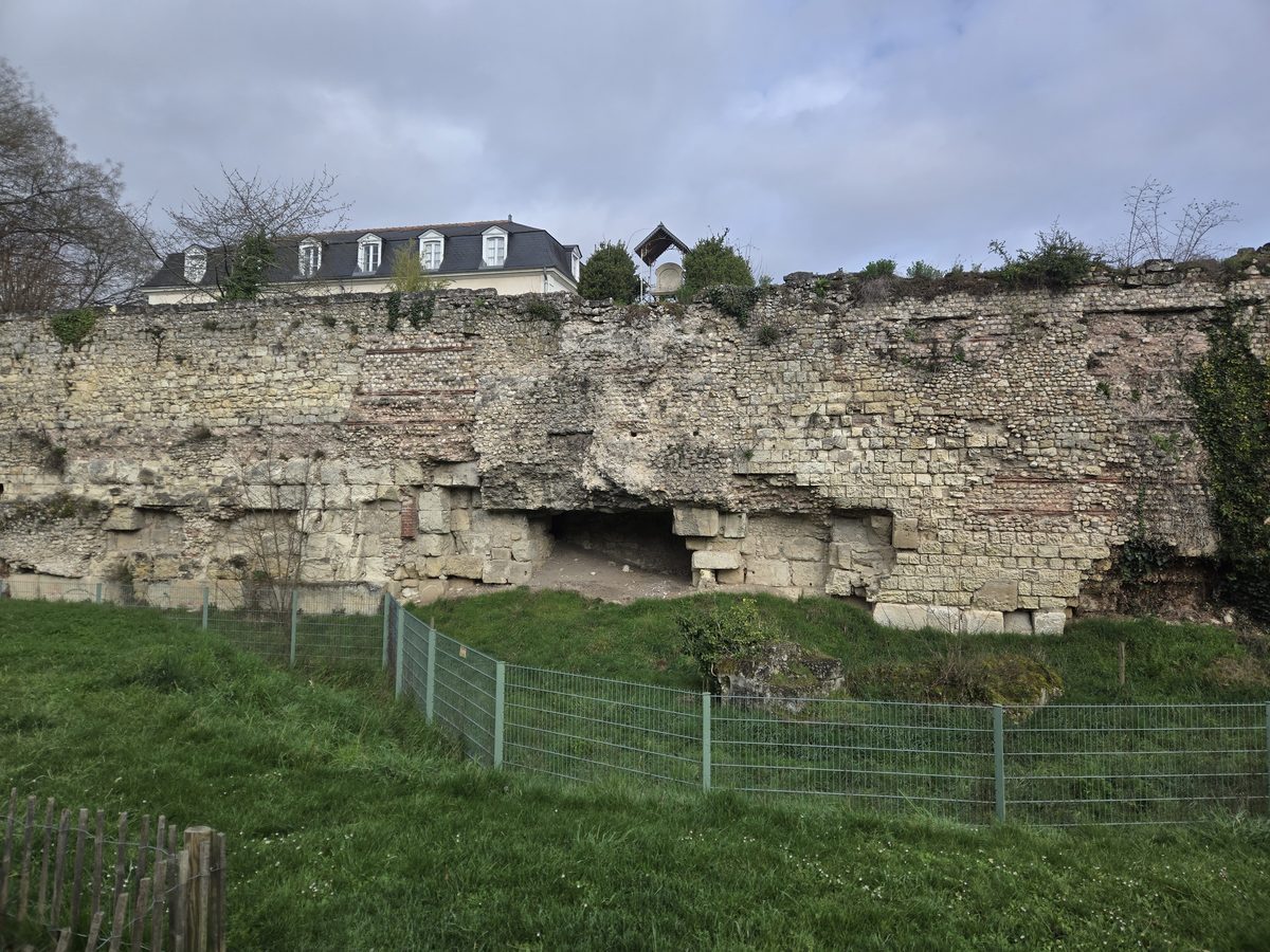 Close-up of the ancient stonework — layers of Roman and Gallic construction