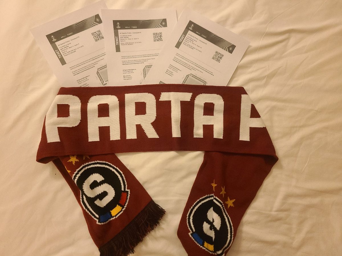 Sparta Praha scarf and Europa League match tickets laid out on a hotel bed